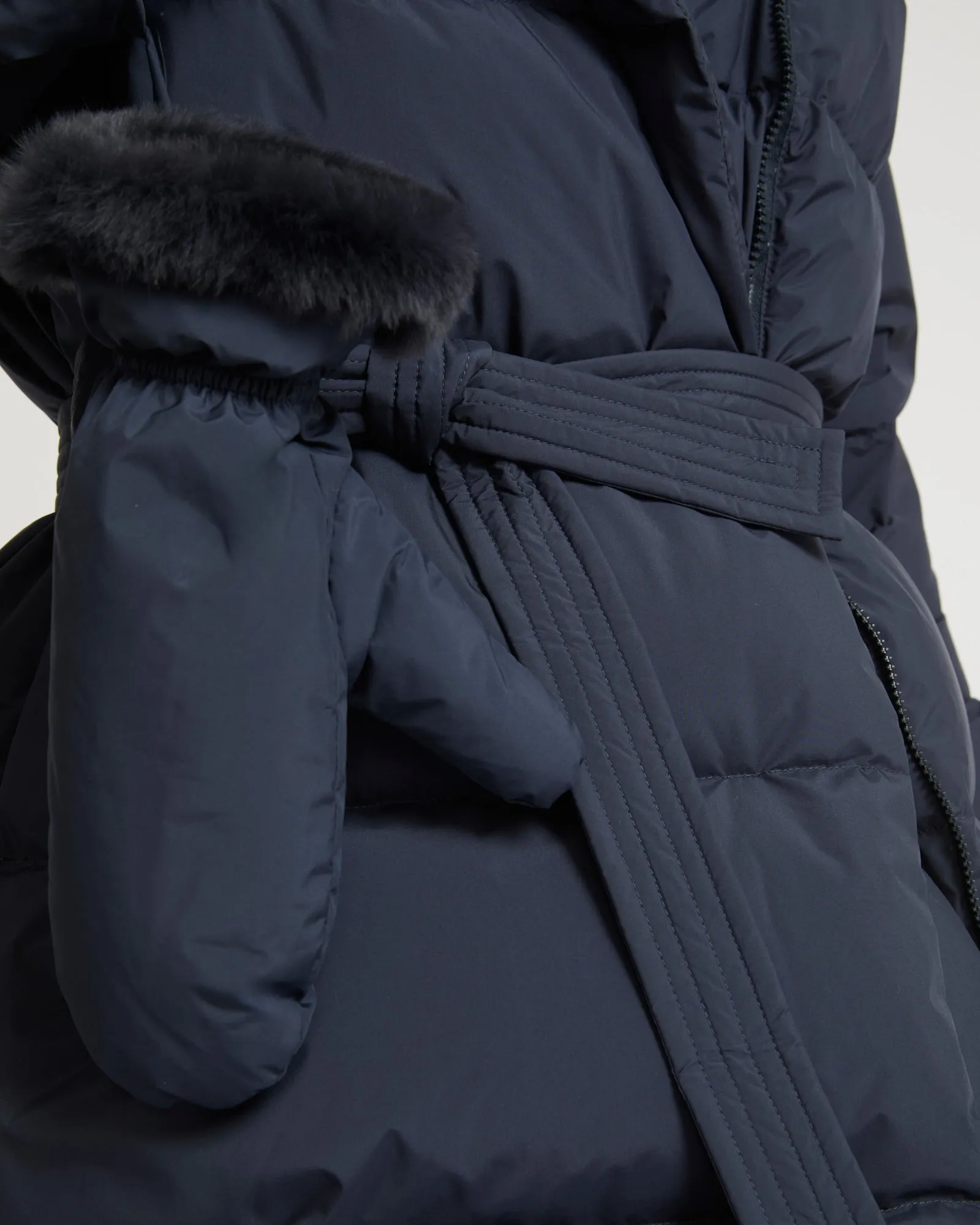 Belted down jacket in waterproof technical fabric with fox and rabbit fur