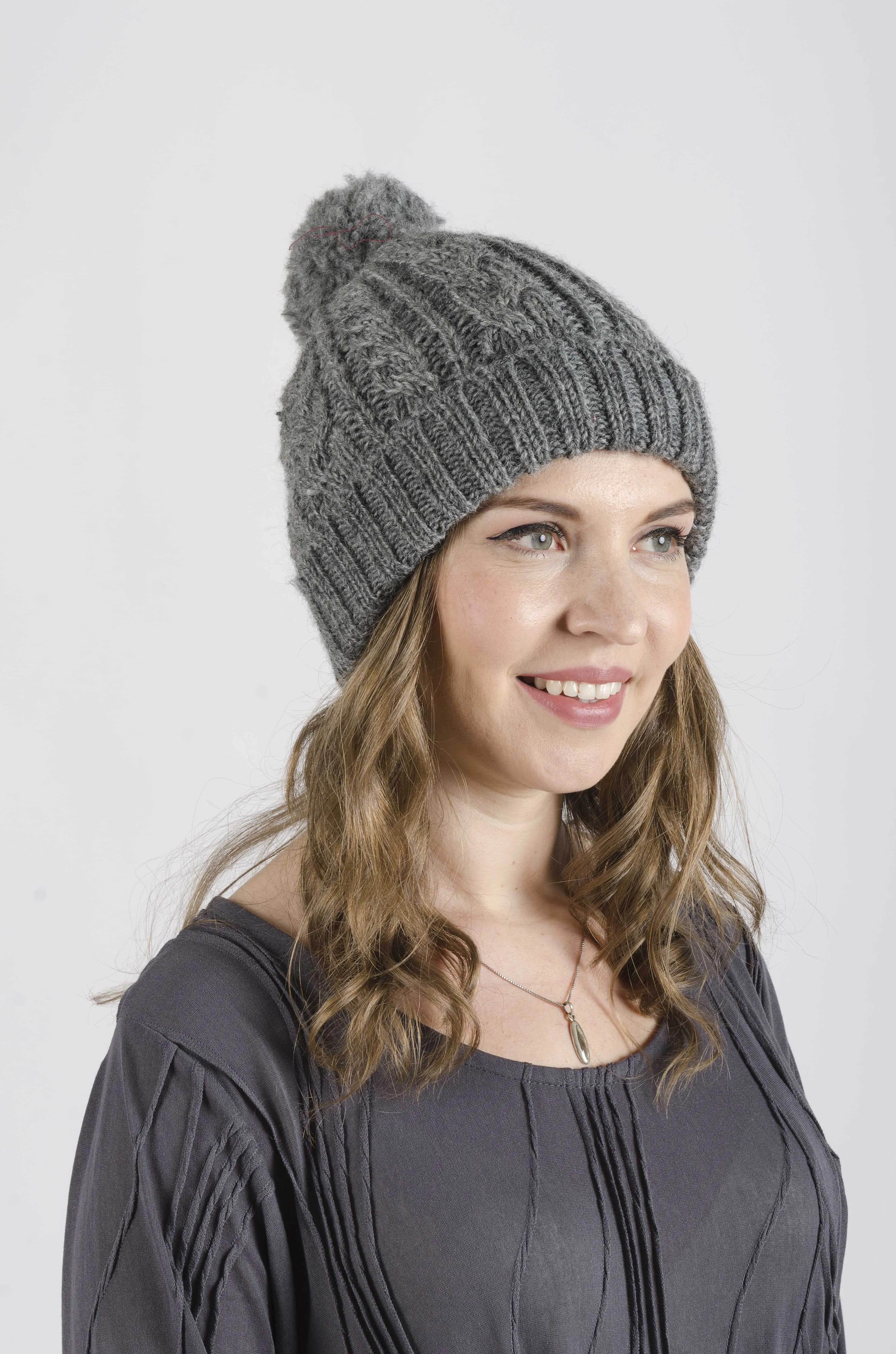 Cable Knit Pom Pom Beanie.