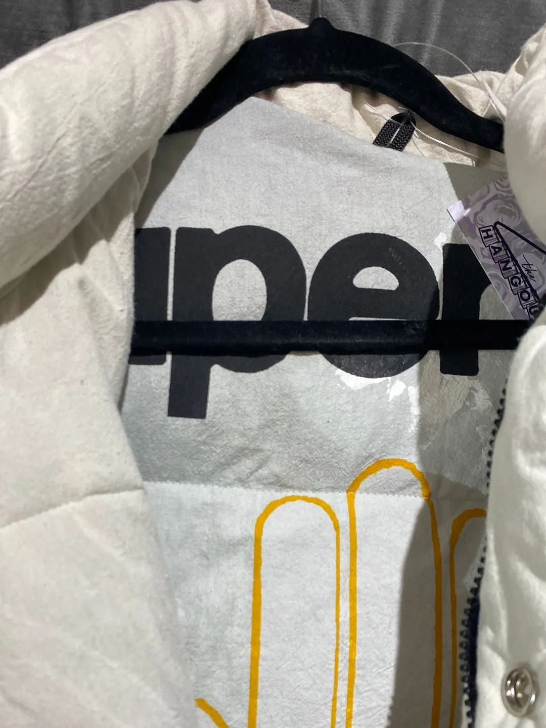 Free City Puffer Vest with Yellow Logo and Paint Hooded