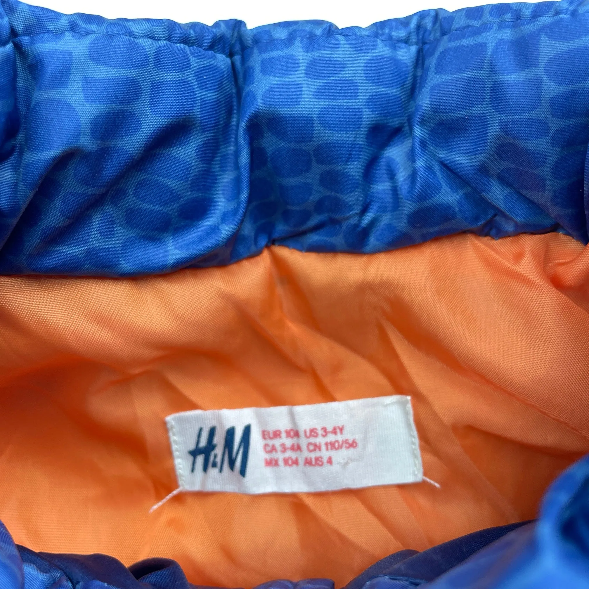 H&M blue puffer vest / sleeveless jacket, size 4, Pre-loved