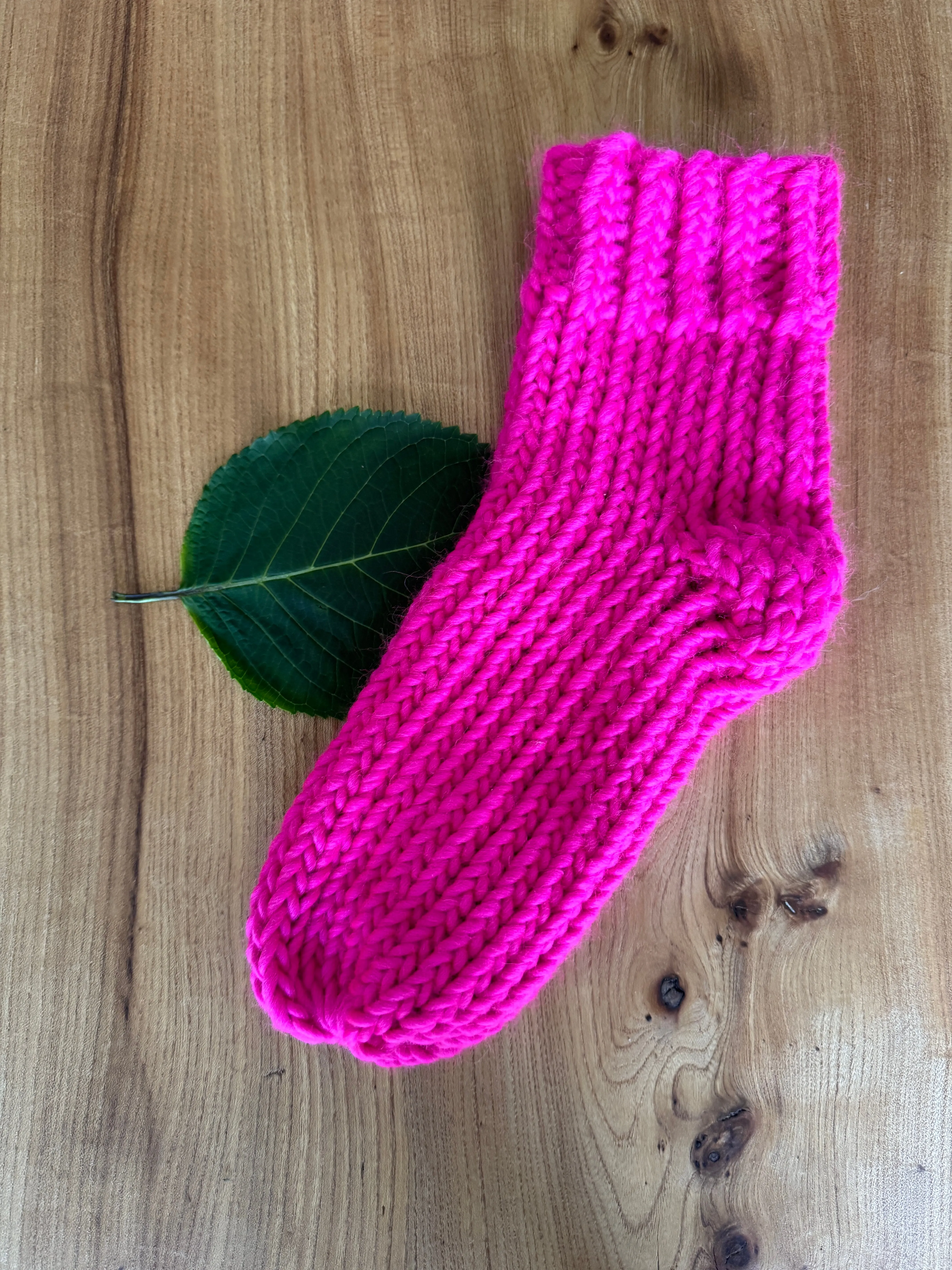 Neon pink hand knitted merino wool socks