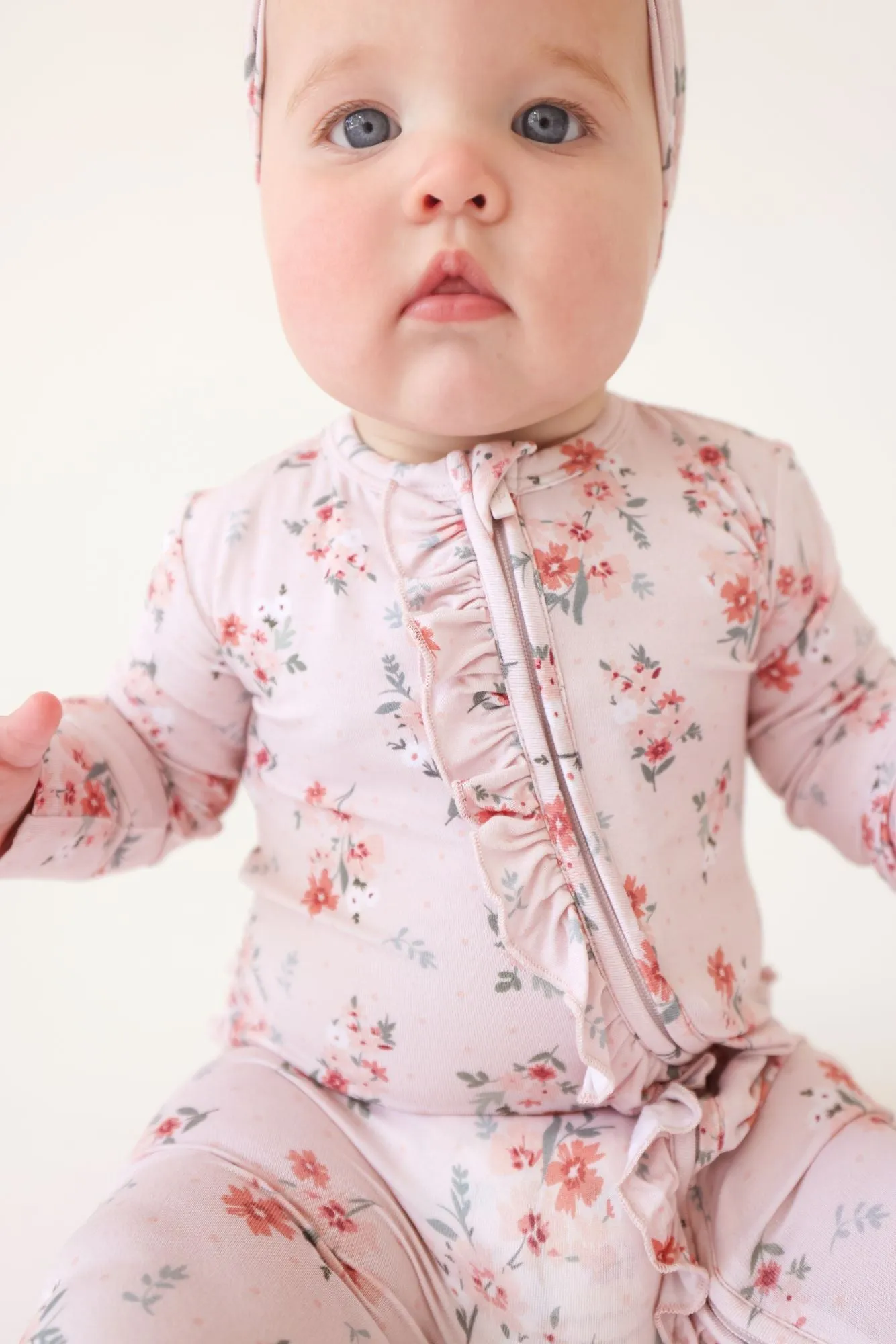 Posh Peanut London Ruffled Zippered Footie