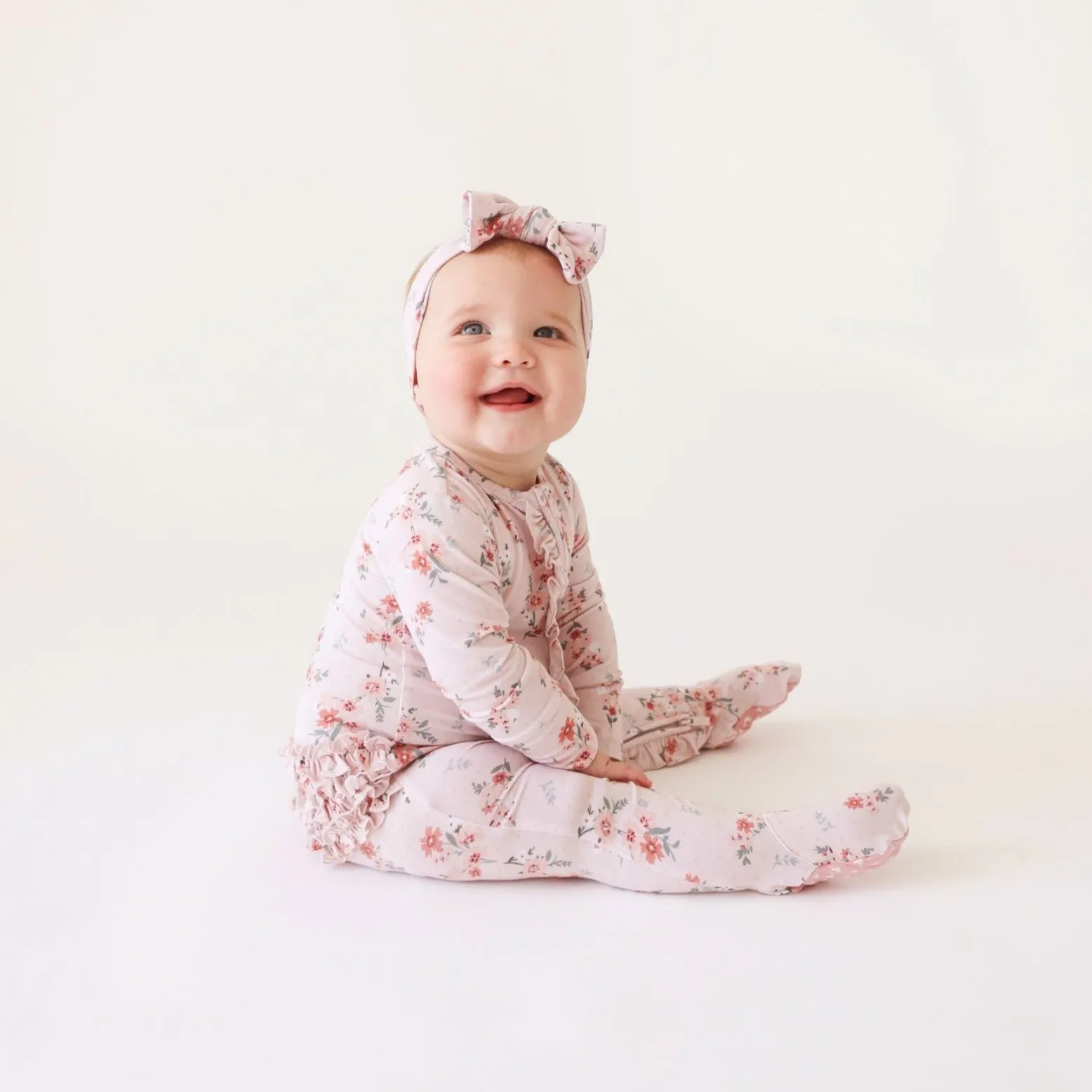 Posh Peanut London Ruffled Zippered Footie