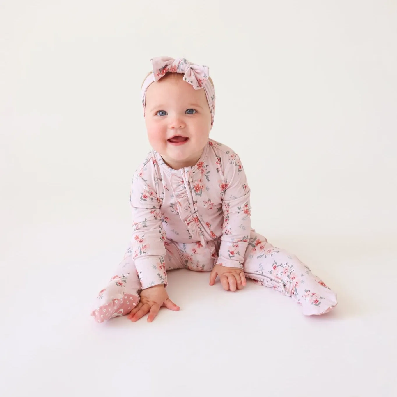 Posh Peanut London Ruffled Zippered Footie