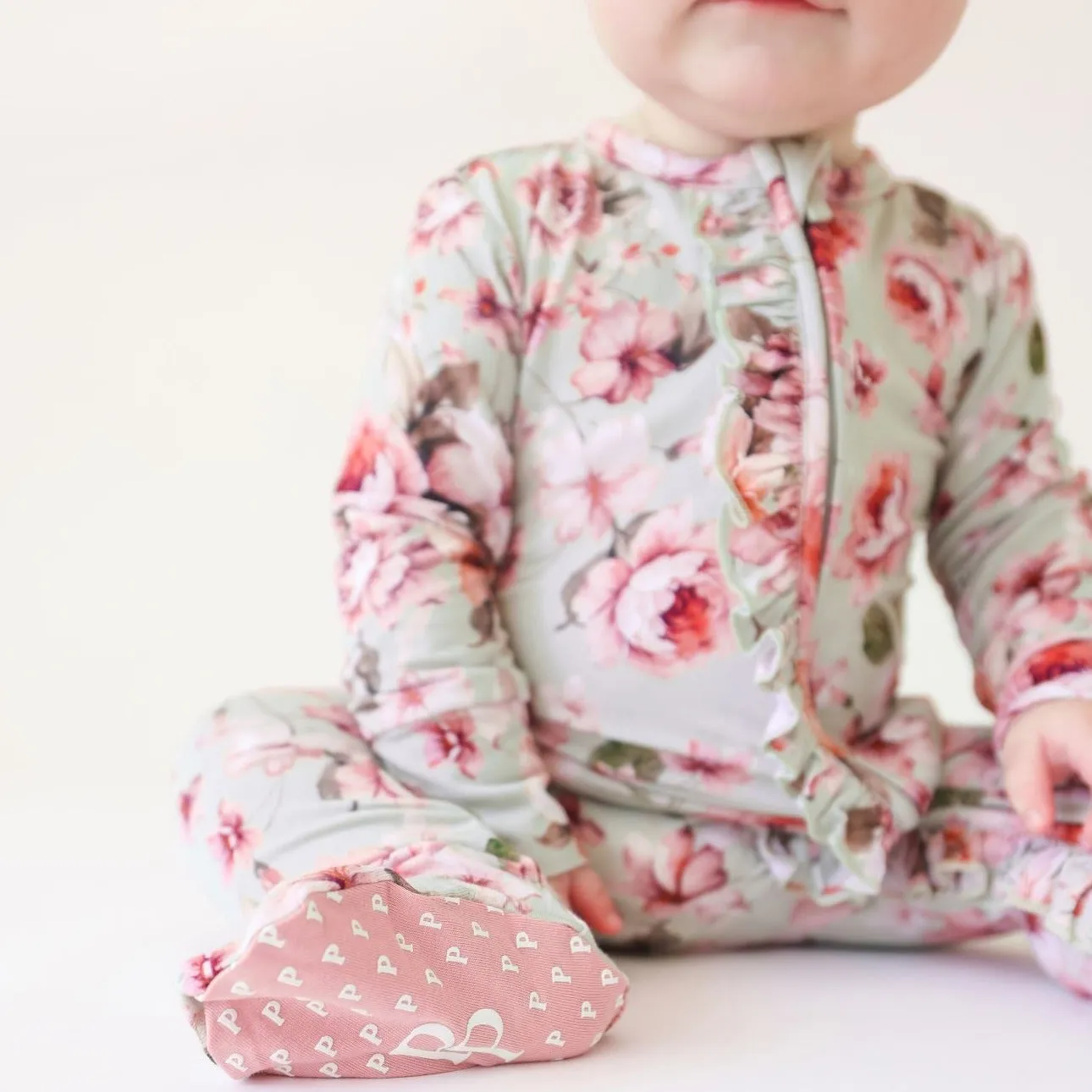 Posh Peanut Millicent Ruffled Zippered Footie