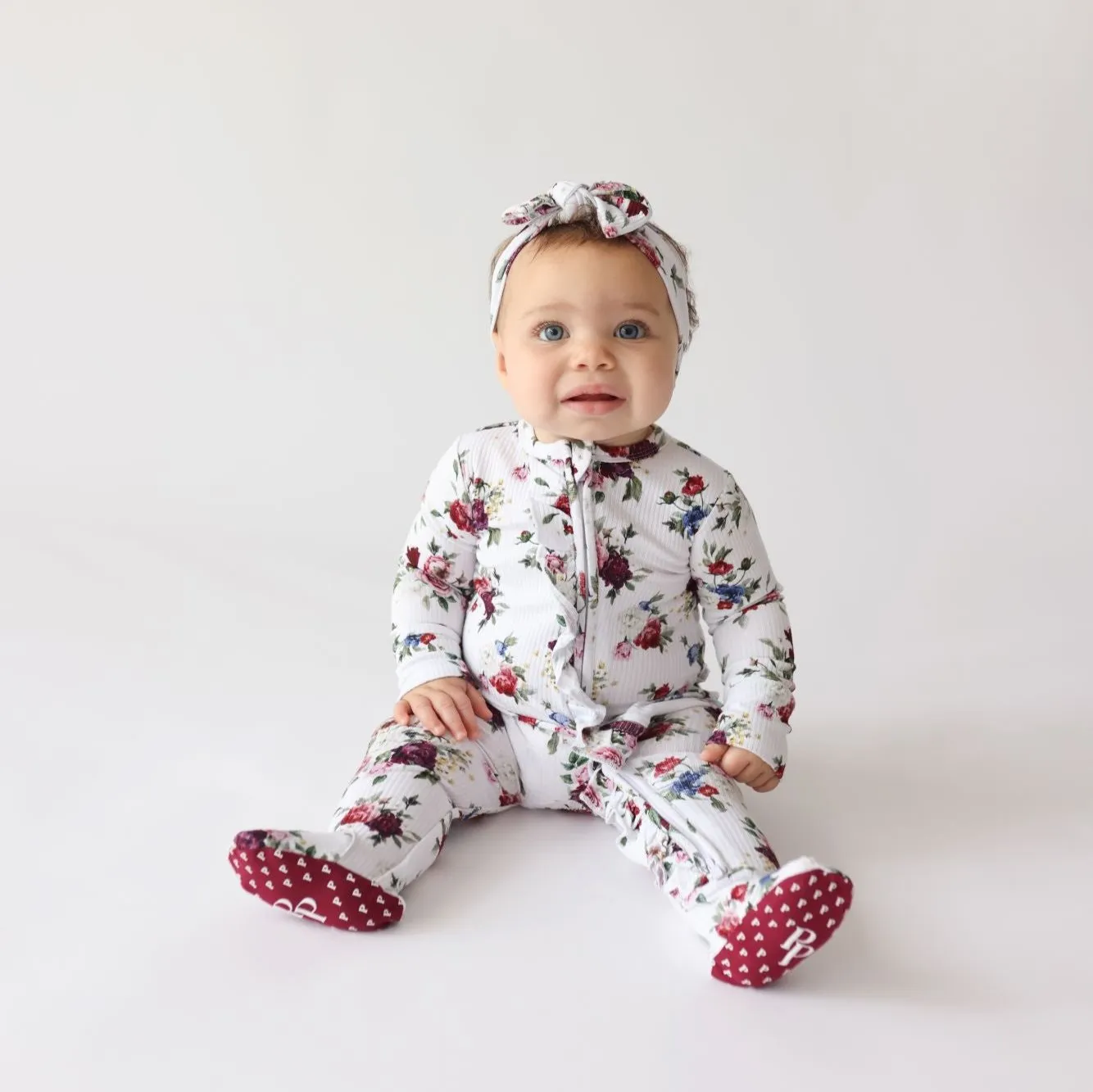 Posh Peanut Philippa Ruffled Zippered Footie