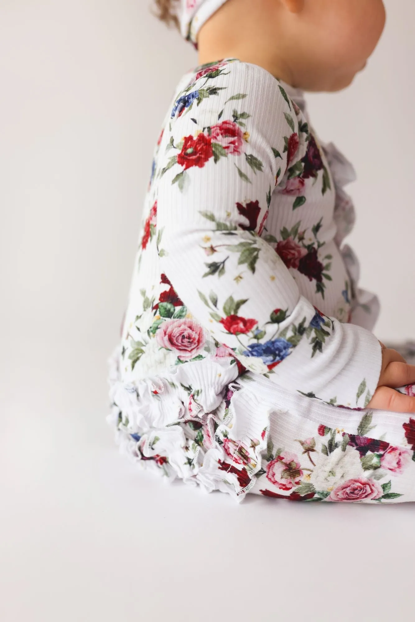 Posh Peanut Philippa Ruffled Zippered Footie