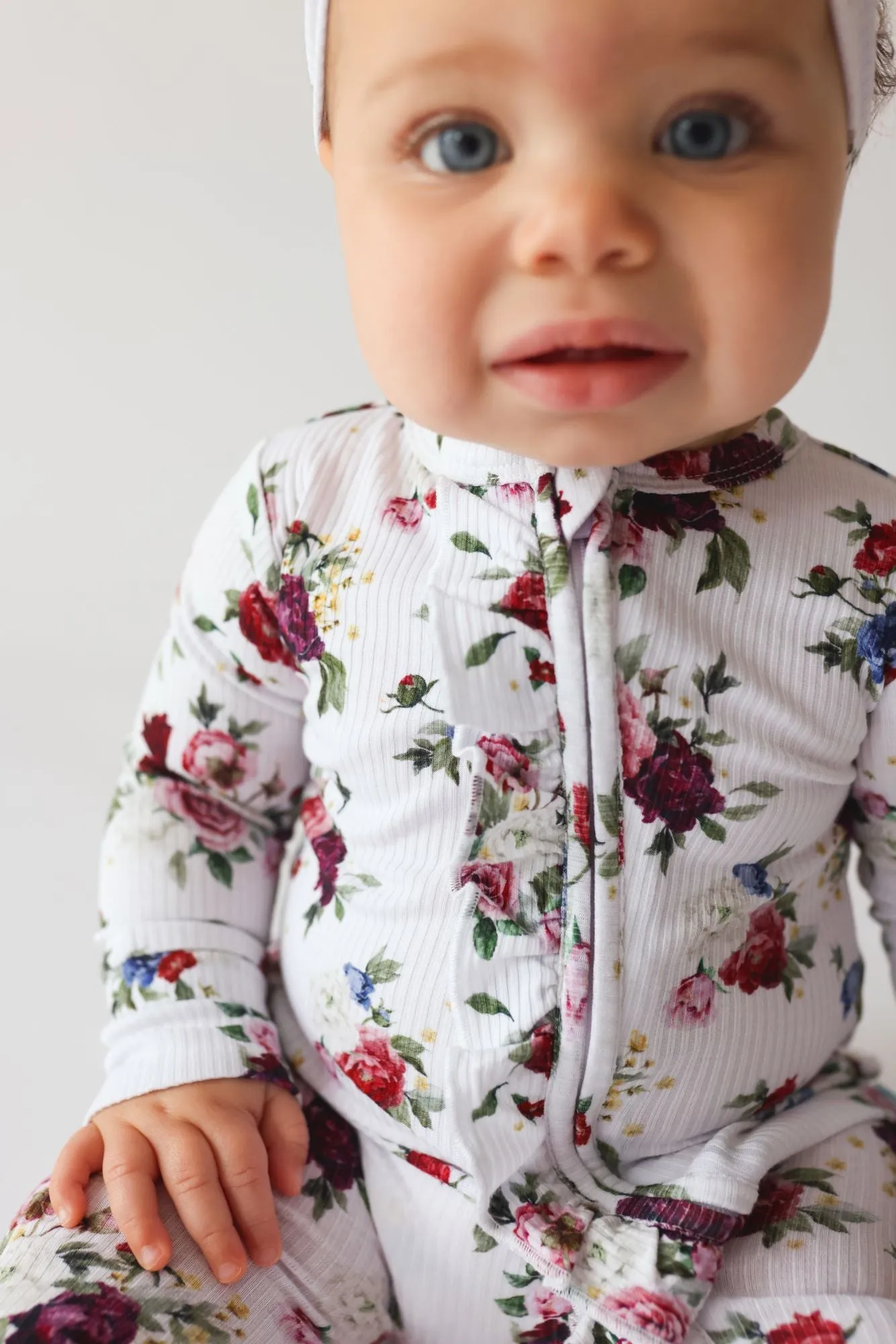 Posh Peanut Philippa Ruffled Zippered Footie