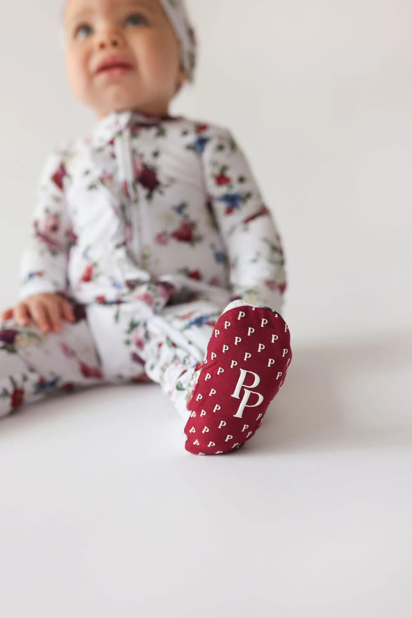 Posh Peanut Philippa Ruffled Zippered Footie