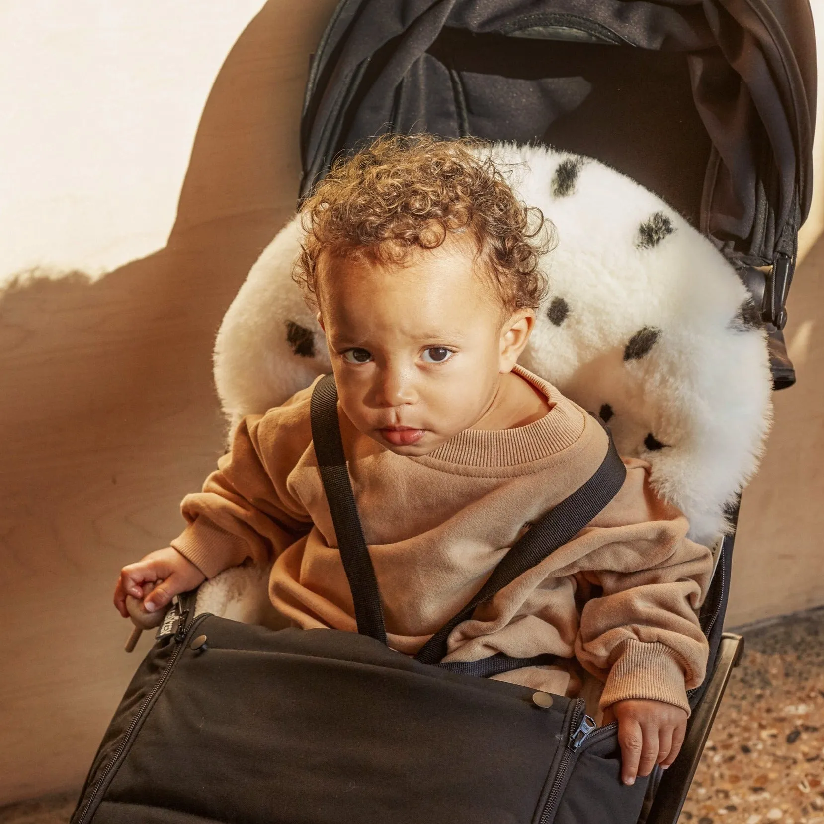 Spotted Sheepskin Snuggler (Dalmation Dot)